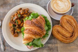 Red Hen lunch ham on croissant, squash salad